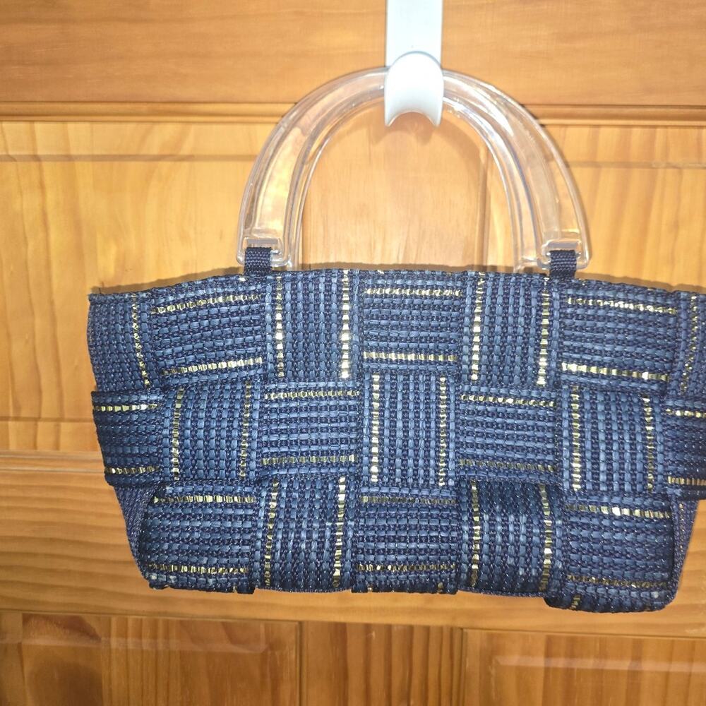 M & G Bertini woven handbag features a distinct blue and gold pattern!